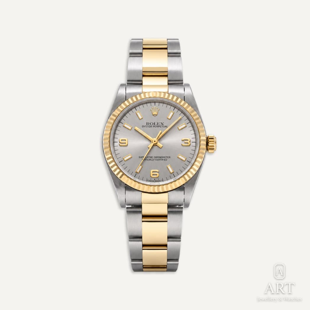 Rolex Oyster Perpetual saati, gümüş kadran, referans 67513